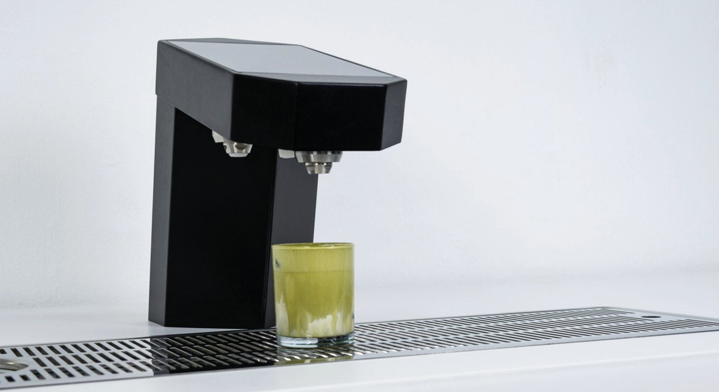 ÜBERMILK PLUS X dispensing a drink at the bar